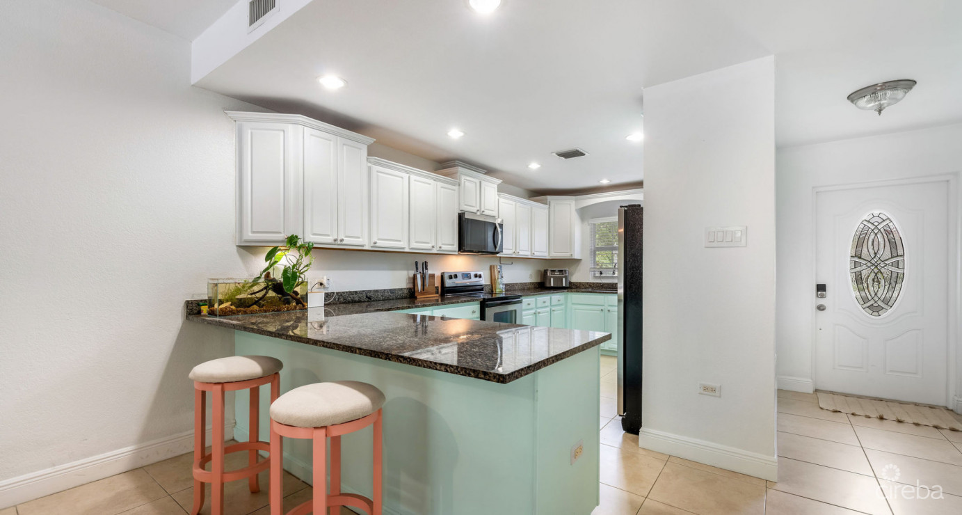 Canal Front Large 2 Bed 2.5 Bath Townhome In Omega Bay With Dock Space