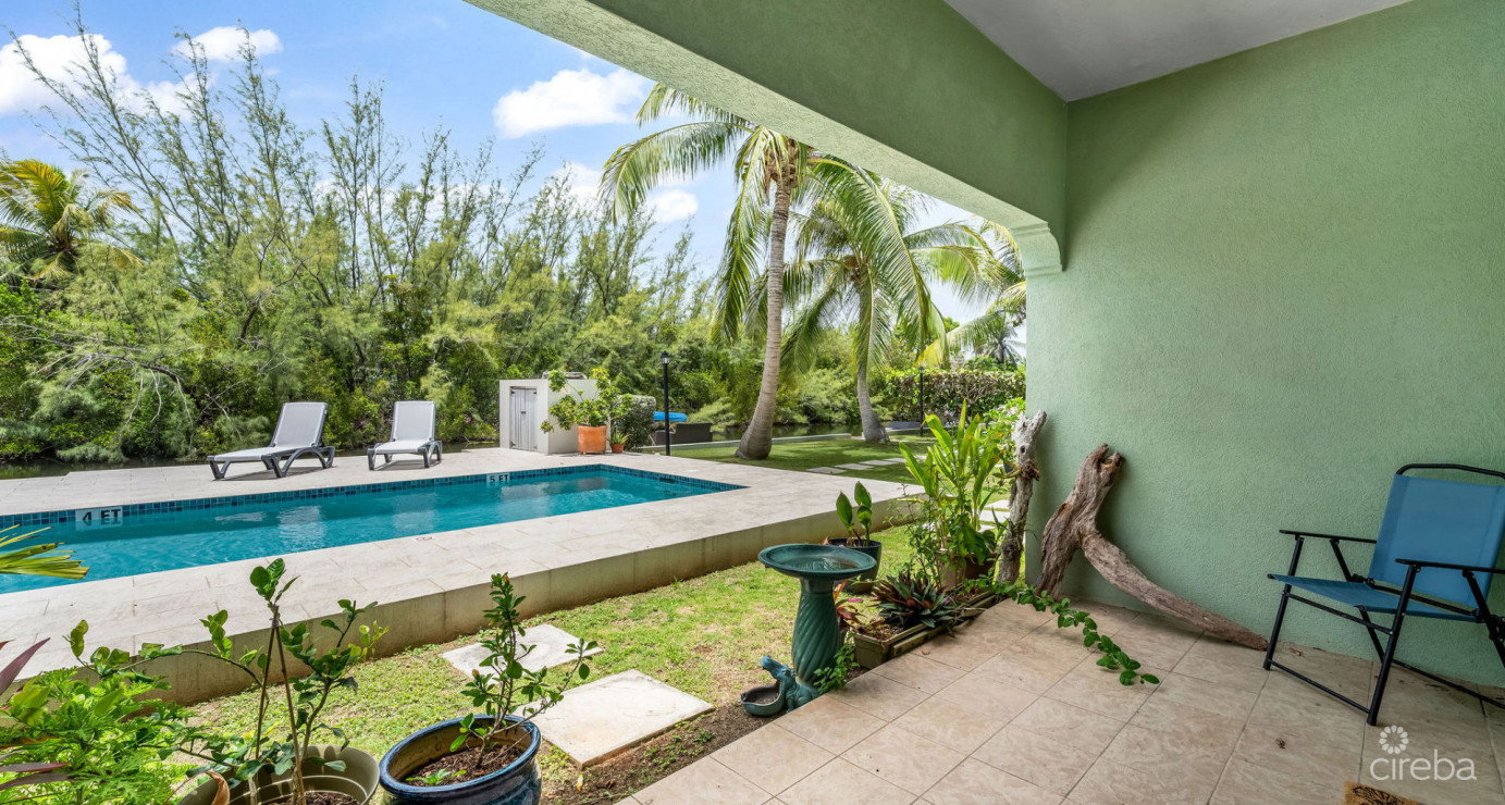 Canal Front Large 2 Bed 2.5 Bath Townhome In Omega Bay With Dock Space