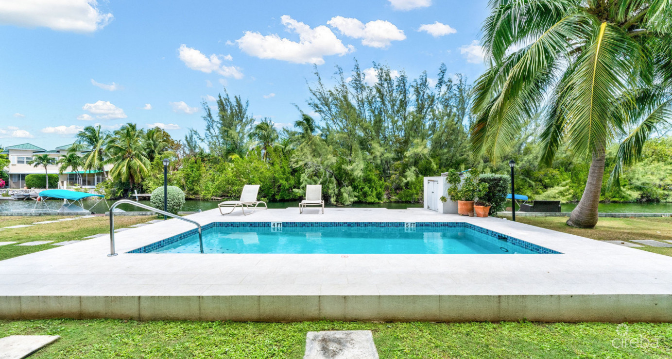 Canal Front Large 2 Bed 2.5 Bath Townhome In Omega Bay With Dock Space