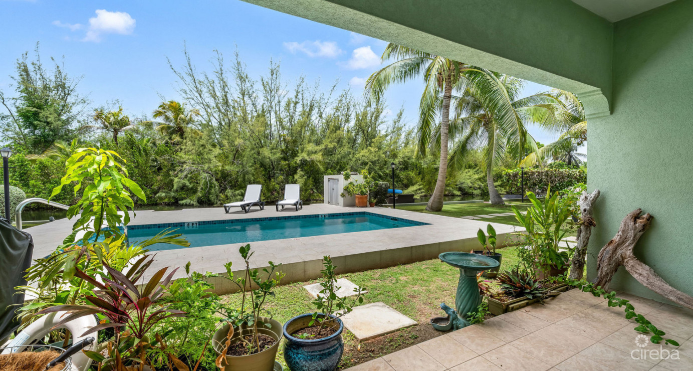 Canal Front Large 2 Bed 2.5 Bath Townhome In Omega Bay With Dock Space