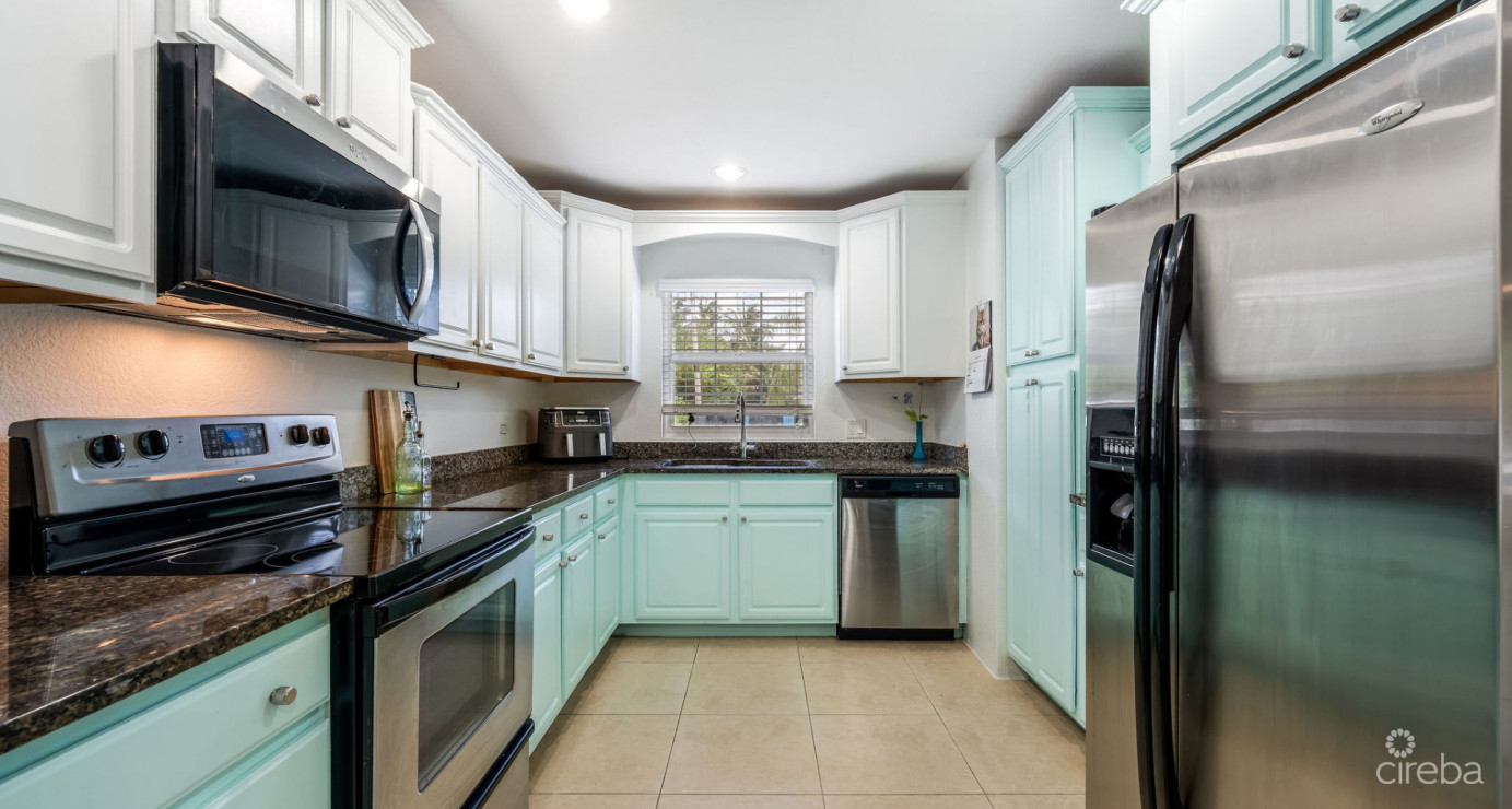 Canal Front Large 2 Bed 2.5 Bath Townhome In Omega Bay With Dock Space
