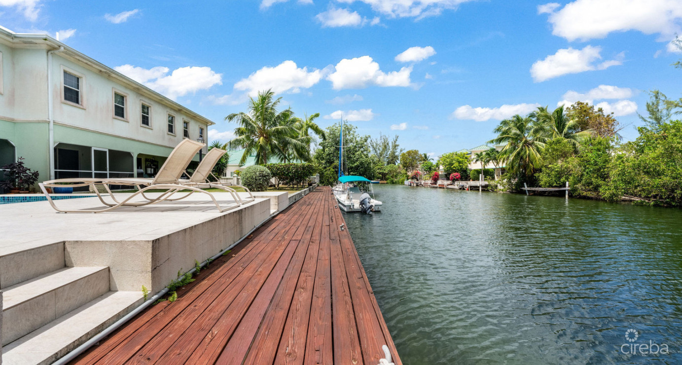 Canal Front Large 2 Bed 2.5 Bath Townhome In Omega Bay With Dock Space