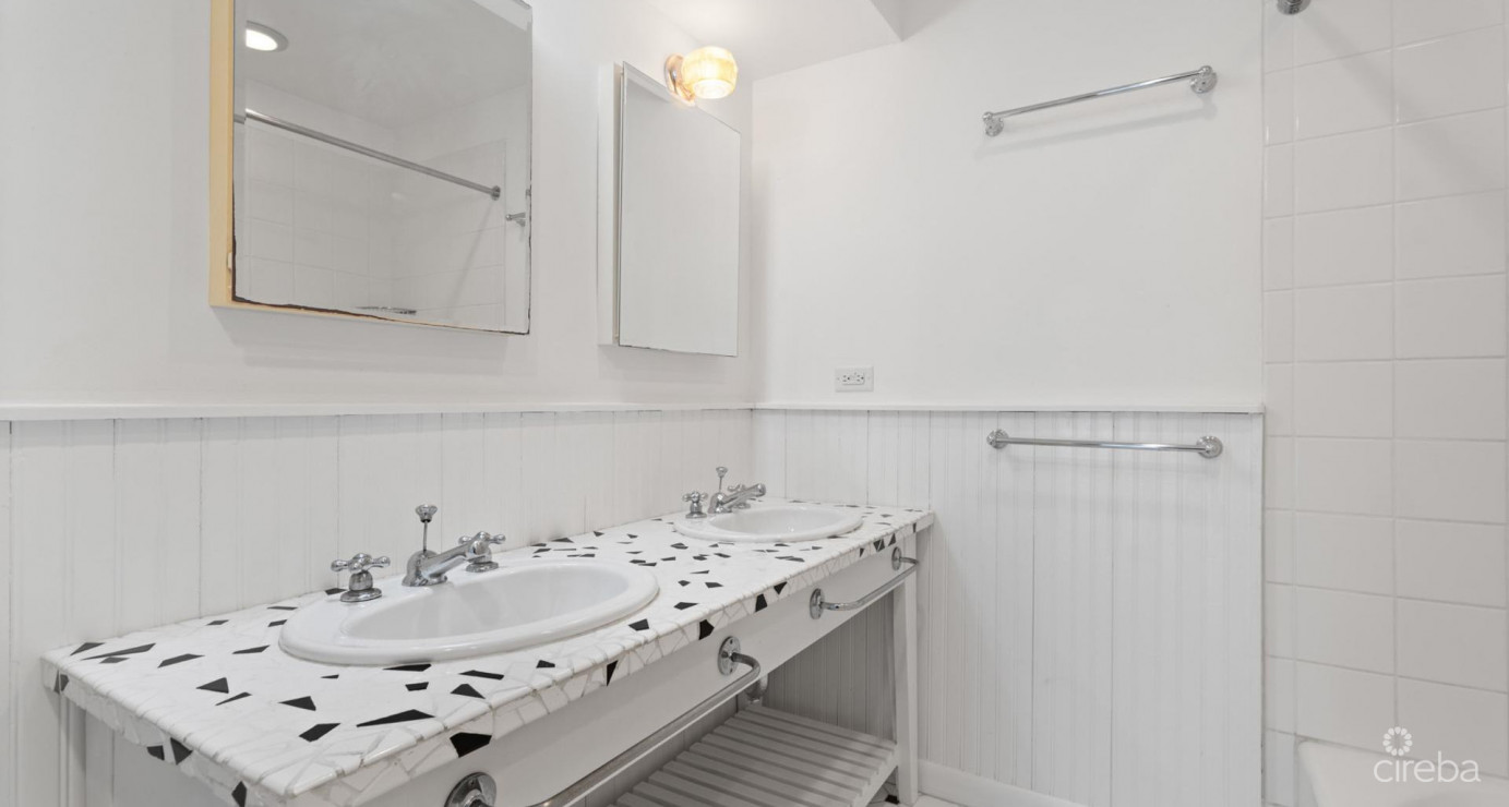 By The Sea #7  South Sound - Oceanfront End Unit With Renovation Required