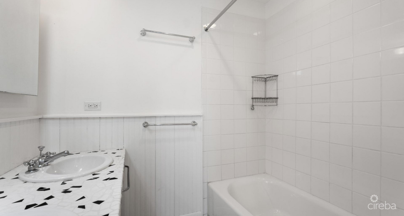 By The Sea #7  South Sound - Oceanfront End Unit With Renovation Required