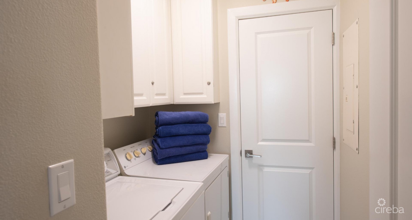 Crescent Point Unit #14  Seven Mile Beach - Fully Remodeled, Turnkey & Income-producing Opportunity