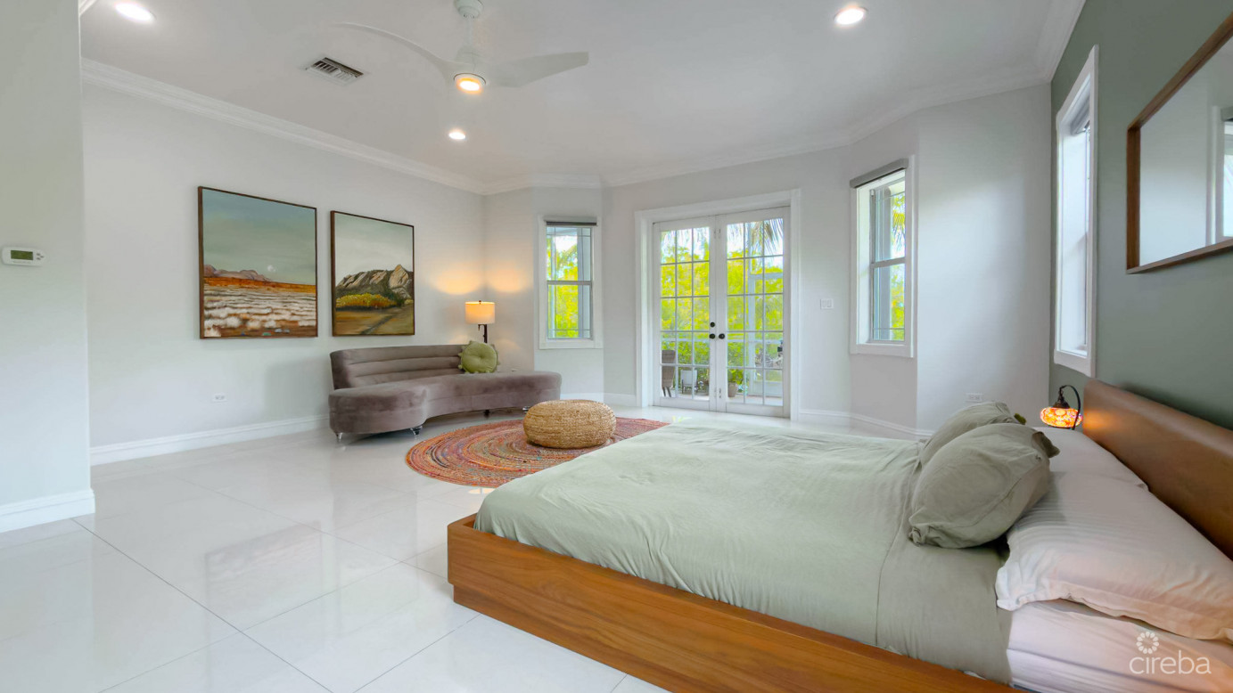 Sun Rose Canal Front Home - North Sound Estates