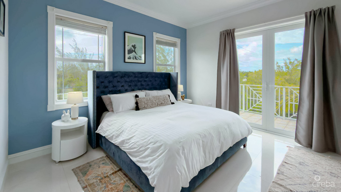 Sun Rose Canal Front Home - North Sound Estates