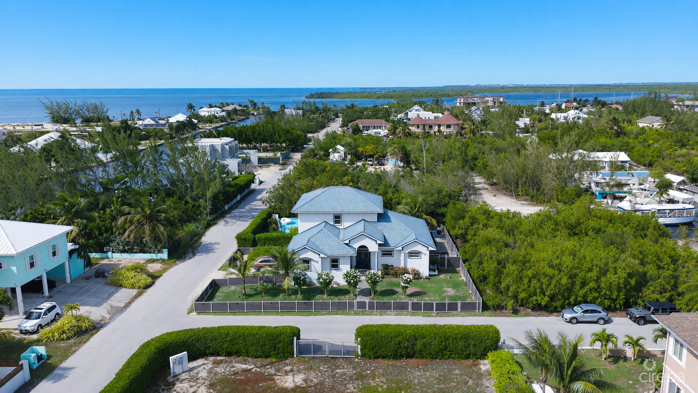 Sun Rose Canal Front Home - North Sound Estates