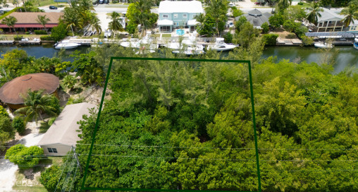 Omega Bay Canal Front Duplex/house Parcel (0.2984 Acre)