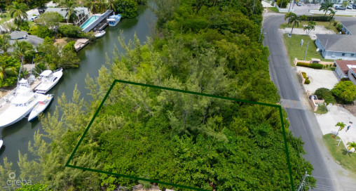 Omega Bay Canal Front Duplex/house Parcel (0.2984 Acre)