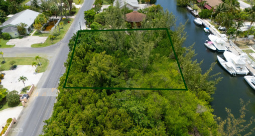 Omega Bay Canal Front Duplex/house Parcel (0.2984 Acre)