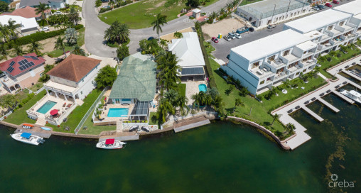 Gated Bimini Drive, Grand Harbour, Single Level 4 Bed Canal Front Home 100k Cash Back!