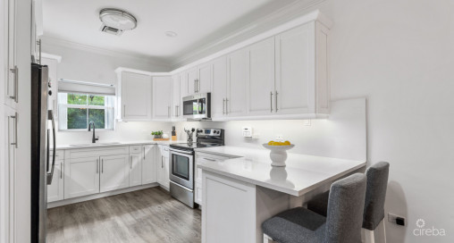 7 Snug Harbour Villas  Updated 2-bed, 2.5-bath In A Prime Seven Mile Beach Corridor Community