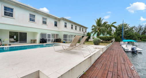 Canal Front Large 2 Bed 2.5 Bath Townhome In Omega Bay With Dock Space