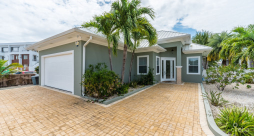 Gated Bimini Drive, Grand Harbour, Single Level 4 Bed Canal Front Home Reduced